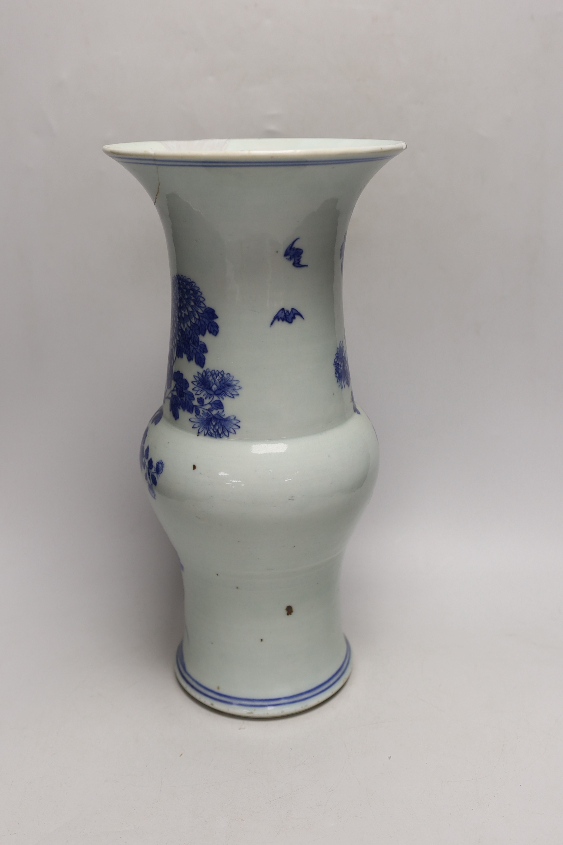 A Chinese blue and white gu shaped vase, 37.5cm high (a.f.)